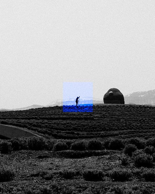 Detail: the lone figure on the hill, inside the square of blue.